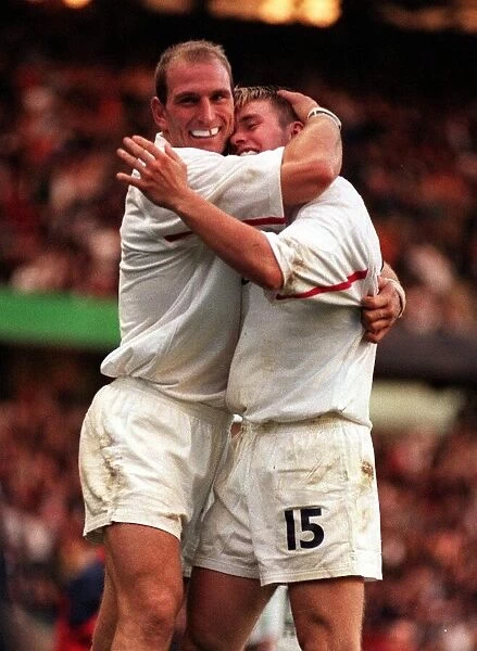 Lawrence Dallaglio congratulates Matt Perry after scoring in the England v Italy match