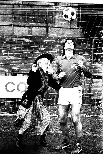 Lib - Football legend George Best giving actress Gudrun Ure some footballing tips during