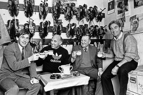 Liverpool manager Kenny Dalglish poses with his staff including Ronnie Moran
