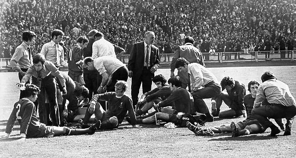 Liverpool manager Bill Shankly tries to encourage his players as the score finishes level