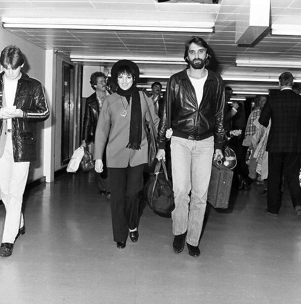 Liza Minnelli and her husband Mark Gero on their way to Rome via Heathrow