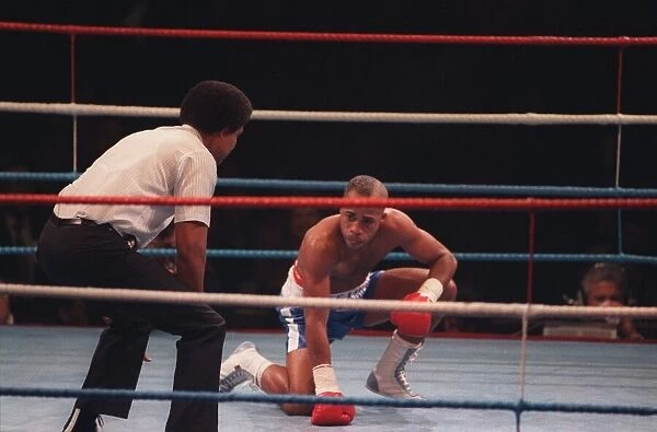 Lloyd Honeyghan boxer on the canvas being counted Mar 90 by the boxing referee