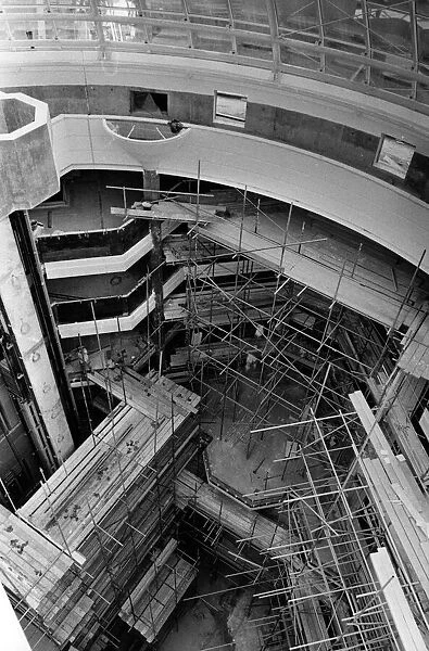 Looking down from the dome, workmen are visible in the West Orchard development as small