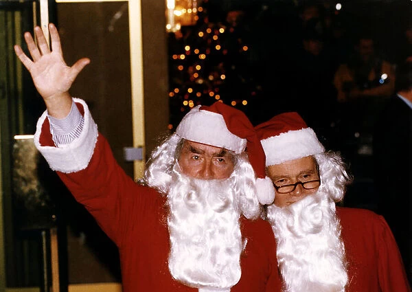 Lord Dennis Healey With Conservative Jeffrey Archer In Santa Claus Costume At Londons