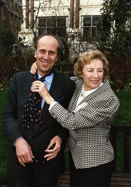 Lord Norman Tebbit with Dame Vera Lynn receives a tie after being named Tiewearer of