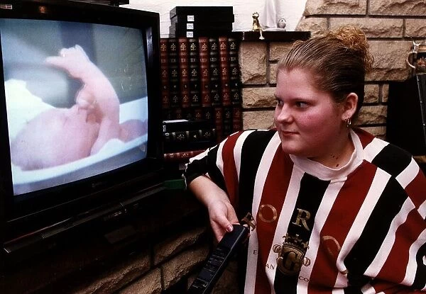 Louise Brown looking at video of herself as the worlds first test tube baby January