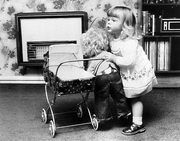 Louise Brown Test Tube Girl playing with doll and dolls pram June 1980