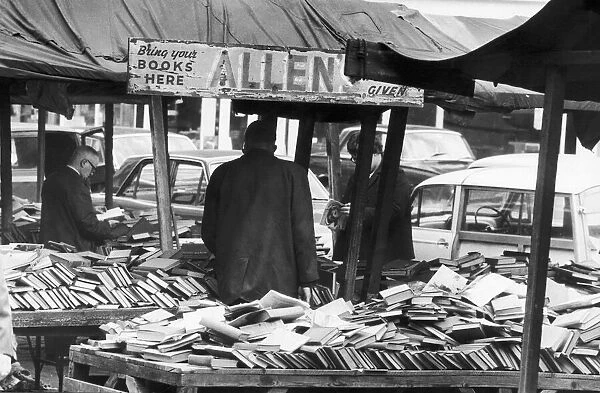 Lunch time loiters at Allens book stall at Shudehill