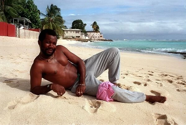 Malcolm Marshall West Indies cricketer relaxes on a sandy beach in Barbados 5th February