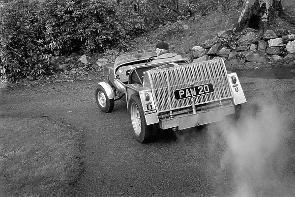 Man driving a steam powered car near his home December 1970 70-11615
