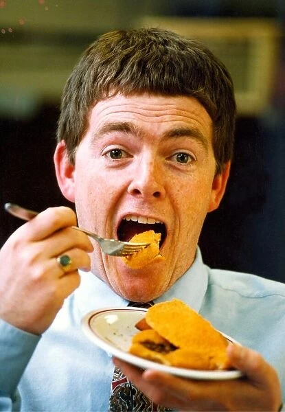 A man eating crispy pancakes in 1994