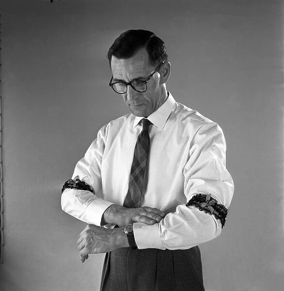 Man with garters for armbands circa 1959