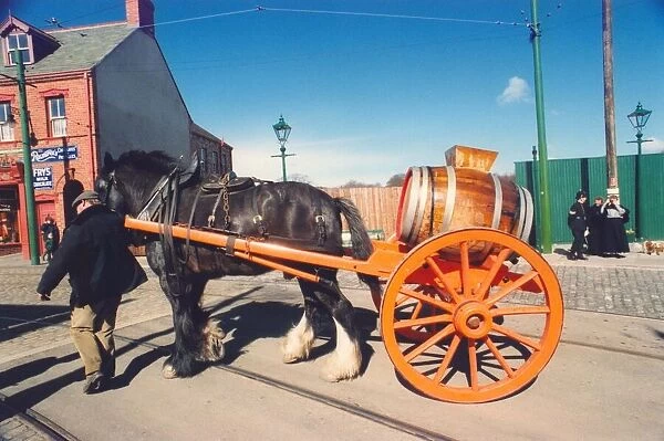 A man with a water cart at Beamish Museum