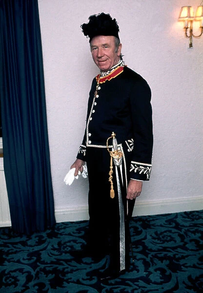 Manchester United manager Matt Busby prepares for his second knighthood granted by