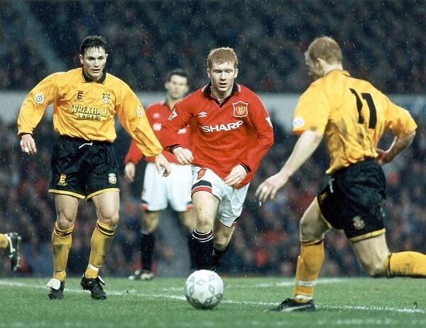 Manchester United v. Wrexham, Paul Scholes drives through the rain, 28th January 1995