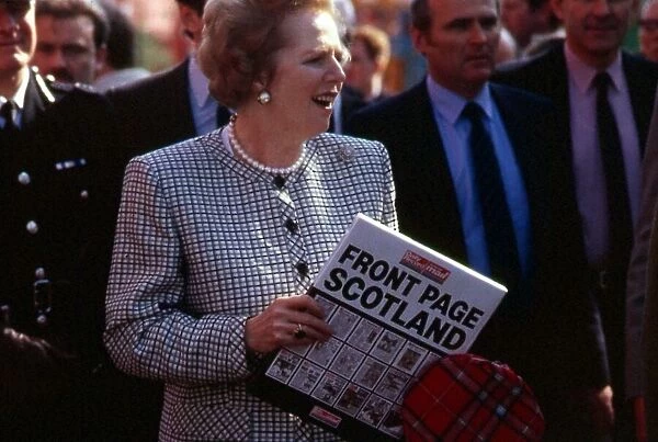 Margaret Thatcher with copy of Daily Record book March 1988