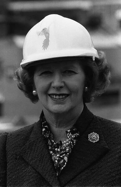 Margaret Thatcher wearing a hard hat at the site of Liverpool Street Station in London