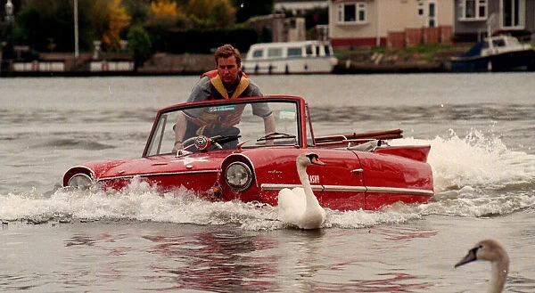 Mark Perkins from Ascot and his 1964 Amphicar March 1998 On the river Thames at