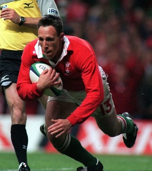 Mark Taylor goes over for the 2nd try in October 1999, during the Wales v Argentina match