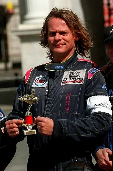 Martin Clunes Actor after a go cart race for the macmillan cancer relief at Marble Arch
