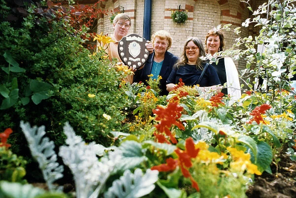 Members of Saltburn Residents and Britain in Bloom Committees with the new Lens Sanders