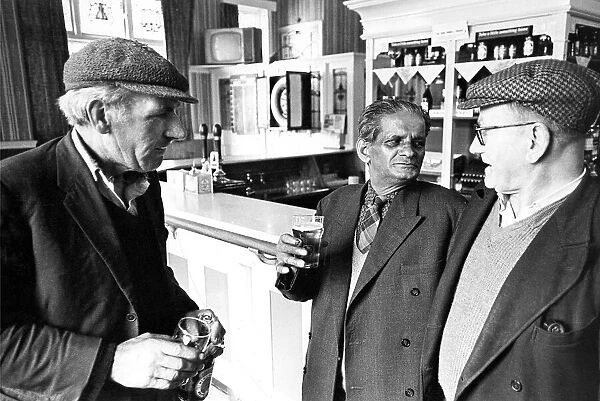Men enjoying a drink together in a bar in South Shields in 1968