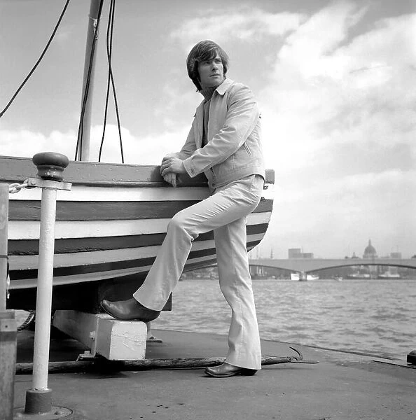 Mens Fashion: Model Richard Hanson seen here on the banks of the Riverr Thames in Central