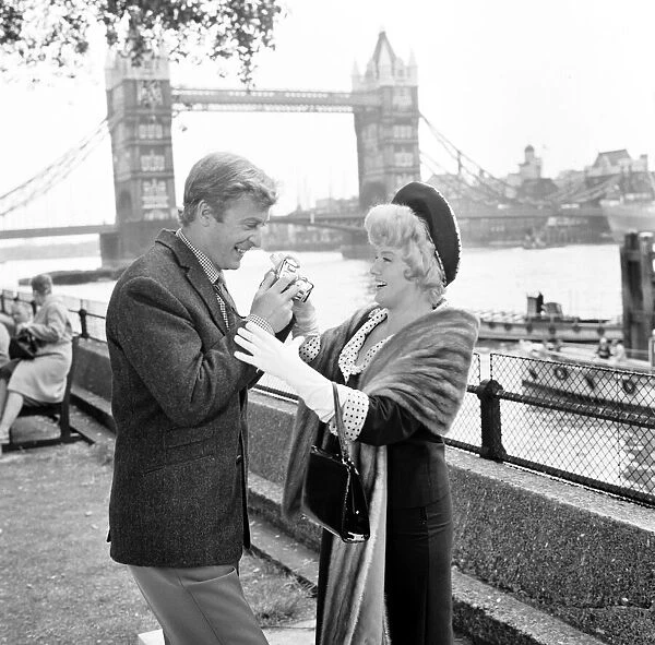 Michael Caine and Shelley Winters filming Alfie at the Tower of London