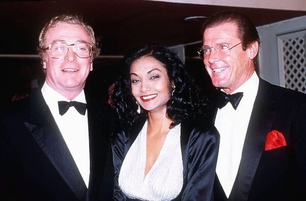 Michael Caine with wife Shakira and Roger Moore at the Barnardos ball at the Grosvenor