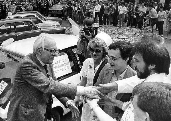 Michael Foot shaking hands with supporters during the walkabout