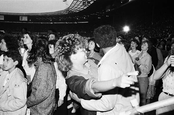 Michael Jackson fans in the audience at Wembley Stadium during his 'Bad'tour