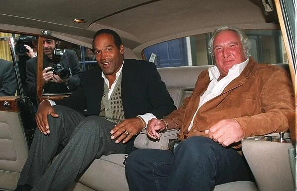 Michael Winner Actor and OJ Simpson in the back of a car