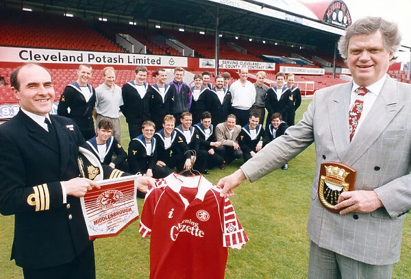 Middlesbroughs chairman, Colin Henderson, presents a set of shirts
