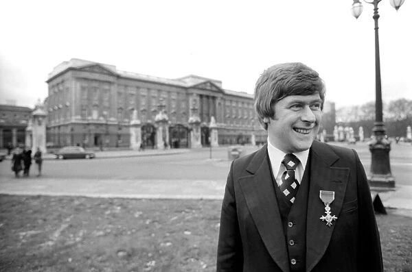 Mike Yarwood outside Buckingham Palace after receiving the O. B. E. December 1976