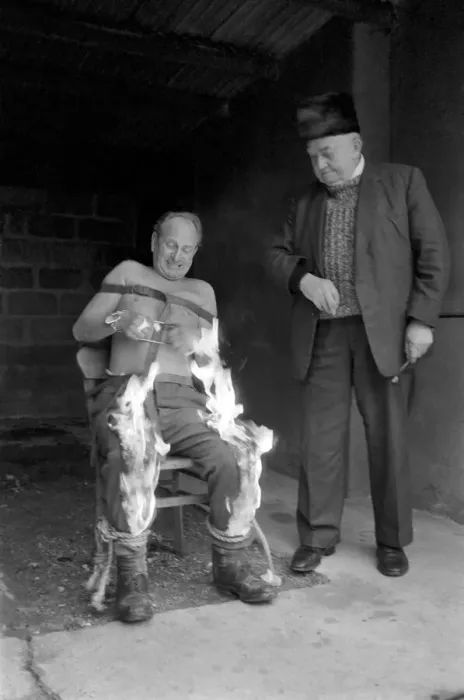 Framed Print : Print of a man setting fire to his trousers Framed Print : Print of a man setting fire to his trousers