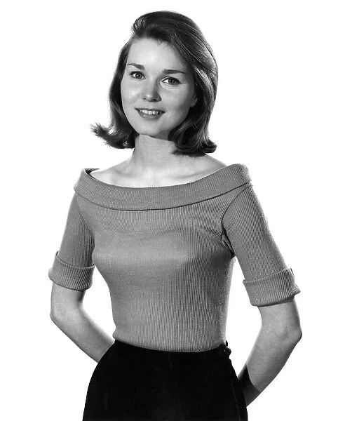 Model Helen Laundy wearing short sleeved top. April 1961 P008831
