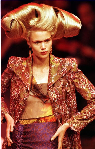 A model walking down the catwalk October 1997 showing Christian Lacrioxs latest designs