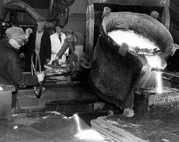 Molten metal is poured out by caster Brian Hunter at Parkfield Foundry, Stockton