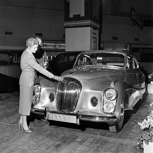 Motor Show: Sir Bernard and Lady Docker photographed beside their new '