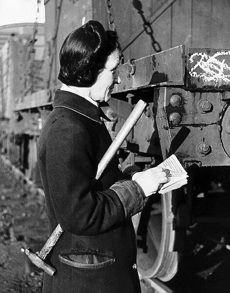 Mrs Christina Axworthy the first woman wagon examiner on the railway. WW2 1943