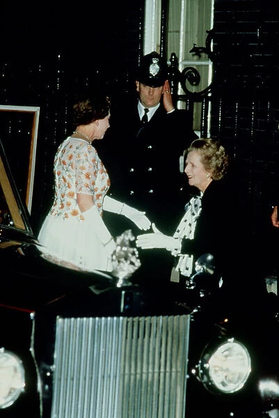 Mrs Margaret Thatcher greets Queen Elizabeth II on her arrival at 10 Downing Street to