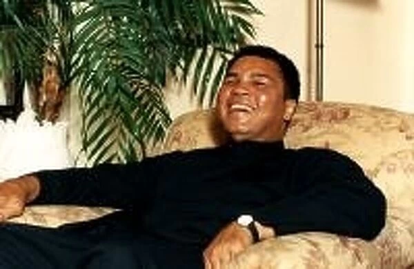 Muhummed Ali (Cassius Clay) Boxer in armchair. August 1992