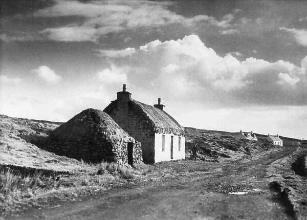 Near Dunvegan, Isle of Skye, Scotland, a typical view Housing Cottage