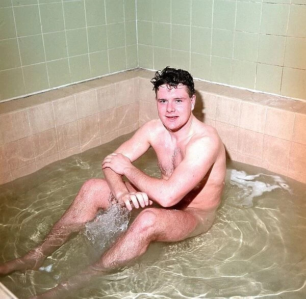 Newcastle United footballer Paul Gascoigne in the bath naked in the dressing rooms at St