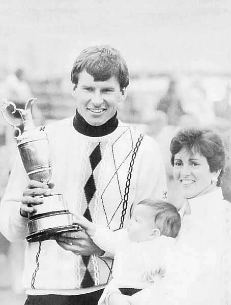 Nick Faldo golfer with wife and daughter holding open golf championship trophy claret jug
