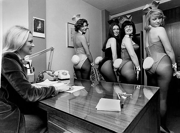 Night Clubs. Bunny Girls in the office having their tails looked at