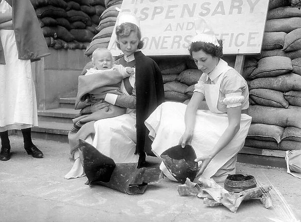 Nurses inspecting shrapnel during WW2 - 1941 Women doing mens jobs during the war