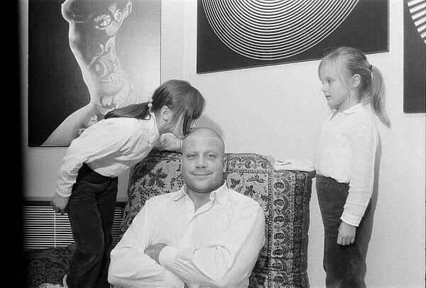 Oliver Reed not wearing his wig at his home in Wimbledon, South West, London