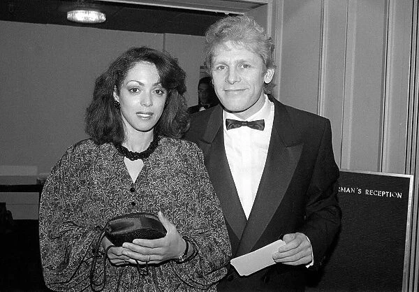 PAUL NICHOLAS AND WIFE LINZI NICHOLAS AT THE BAFTA AWARDS 23  /  03  /  1987
