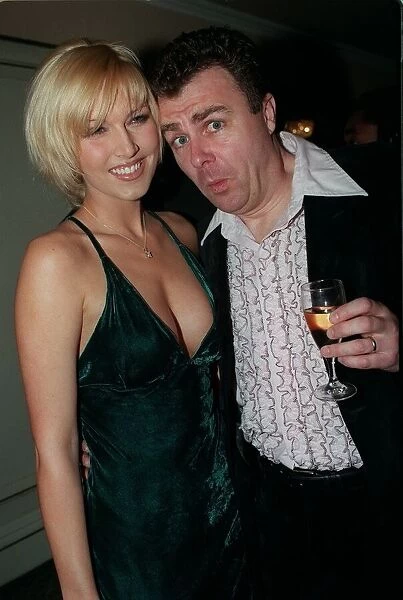 Paul Ross TV Presenter April 98 At Planet Hollwood with his arm round model Emma